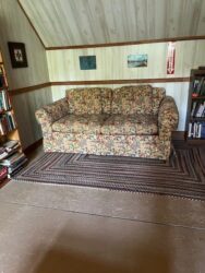 A couch in a room at lodges in North Carolina.